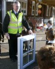 Mr Spooner shows off the fully glazed window